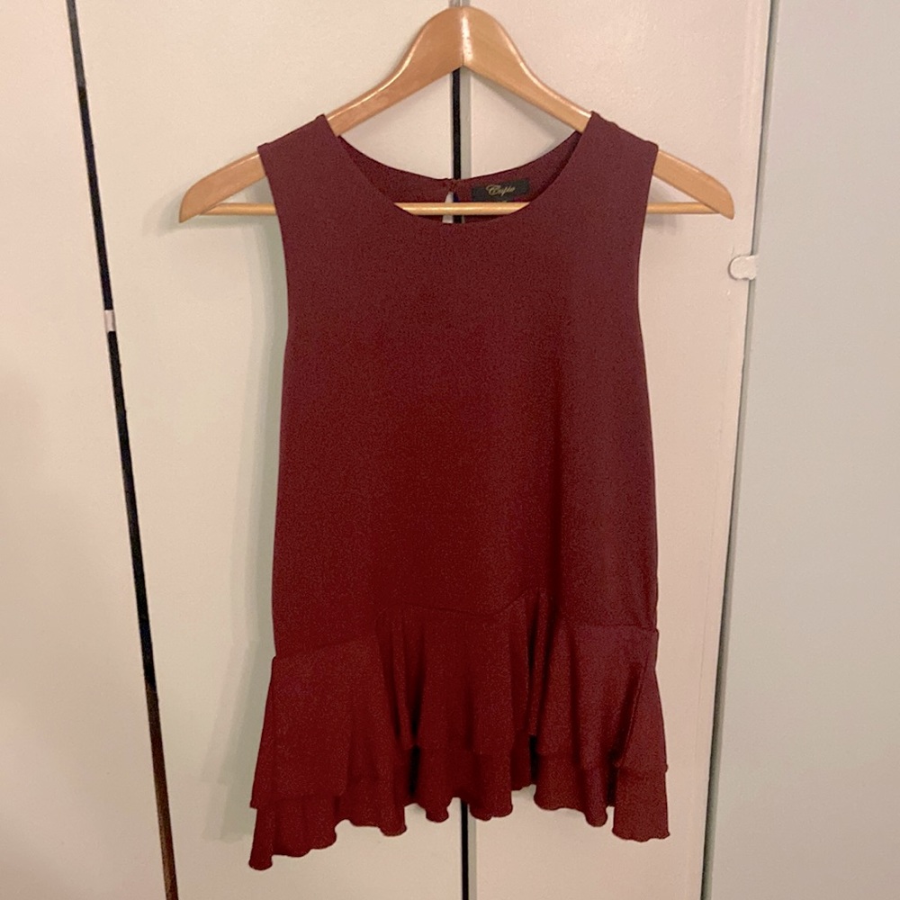 Peplum burgundy top. Size L